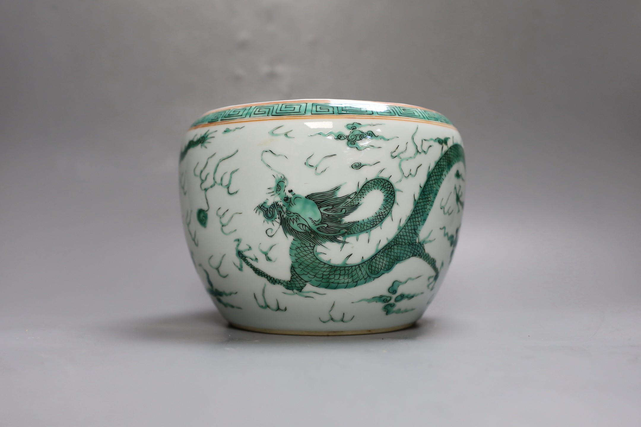 A Chinese famille verte dragon jardiniere, 14.5cm tall